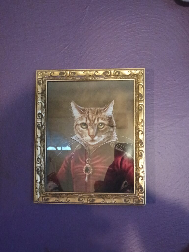 A renaissance-style portrait of a noblewoman with a cat's head